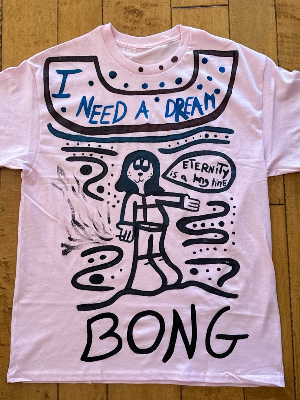 Pink Graphic Tee with 'I Need a Dream' Artwork